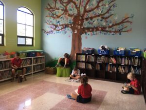 CRIA kids in school library